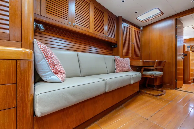 Slide: The Image of Luxurious interior of 2005 Nautor Swan 82S yacht with wooden finishes and comfortable seating. - 24