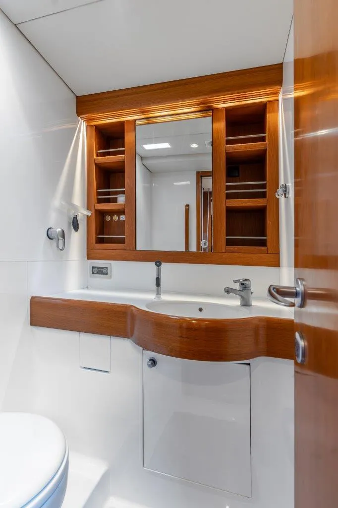Slide: The Image of Luxurious bathroom in 2005 Nautor Swan 82S yacht with wooden cabinetry. - 33