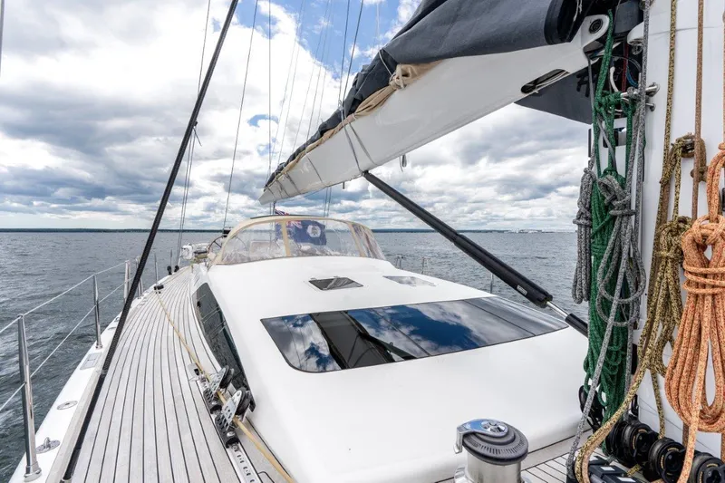 Slide: The Image of Nautor Swan 82S 2005 sailboat deck with rigging and ocean view. - 6