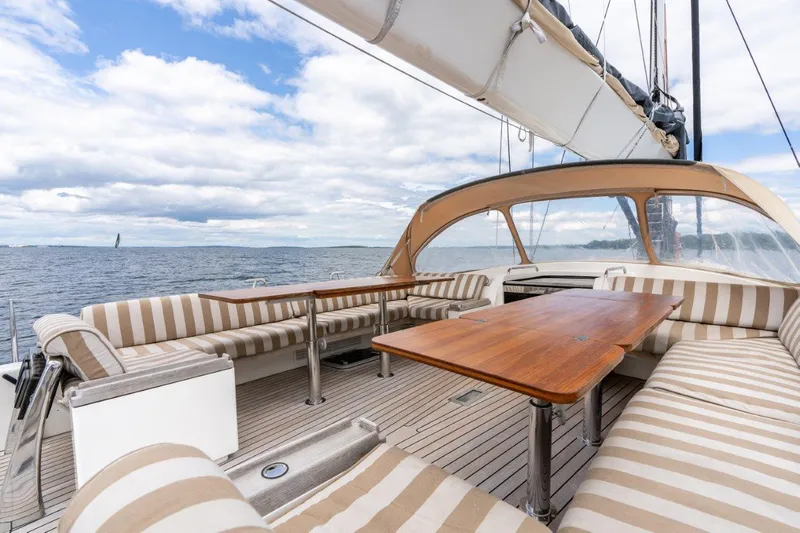 Slide: The Image of Luxurious deck seating on 2005 Nautor Swan 82S yacht with ocean view. - 9