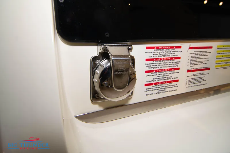 Slide: The Image of 2024 Invictus GT320S boat fuel cap and warning labels. - 12