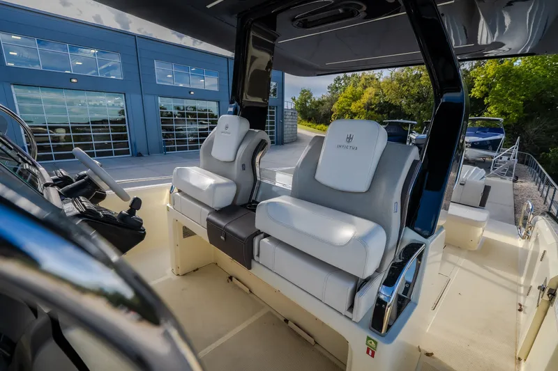 Slide: The Image of 2024 Invictus GT320S boat interior with luxurious seating and modern design. - 40