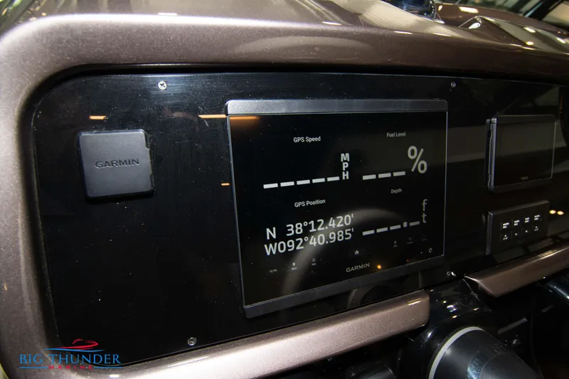 Slide: The Image of 2024 Invictus GT320S dashboard with Garmin GPS display showing speed and coordinates. - 34