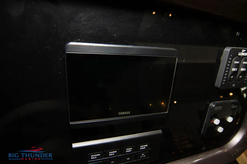 Slide: The Image of Control panel of 2024 Invictus GT320S boat with Yamaha display. - 35