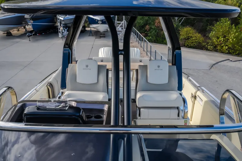 Slide: The Image of 2024 Invictus GT320S boat interior with luxurious seating and modern design. - 38