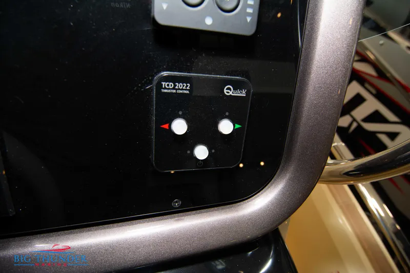 Slide: The Image of Invictus GT320S 2024 boat throttle control panel, featuring Quick TCD 2022. - 38