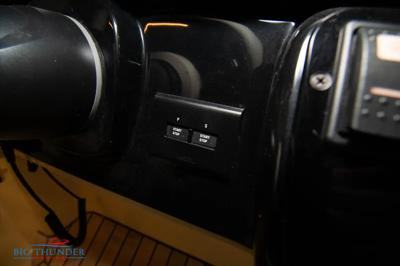 Slide: The Image of 2024 Invictus GT320S boat dashboard with start/stop buttons. - 41