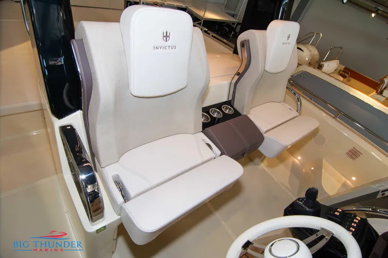 Slide: The Image of Luxury seating on the 2024 Invictus GT320S boat model. - 48