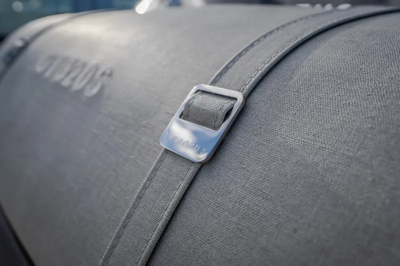 Slide: The Image of Close-up of 2024 Invictus GT320S fabric detail with metal buckle. - 36