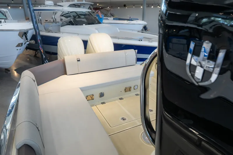 Slide: The Image of 2024 Invictus GT320S luxury boat interior with sleek seating and modern design. - 17