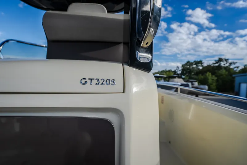 Slide: The Image of 2024 Invictus GT320S boat detail with clear sky background. - 27