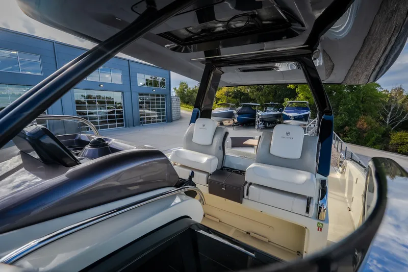 Slide: The Image of 2024 Invictus GT320S luxury boat interior with sleek design and comfortable seating. - 39