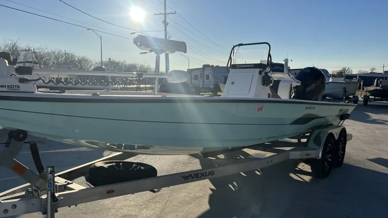 Slide: The Image of 2022 Vexus AVX2180CC boat on trailer in outdoor setting. - 12