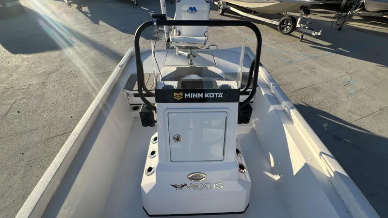 Slide: The Image of 2022 Vexus AVX2180CC boat with Minn Kota trolling motor, viewed from the bow. - 3