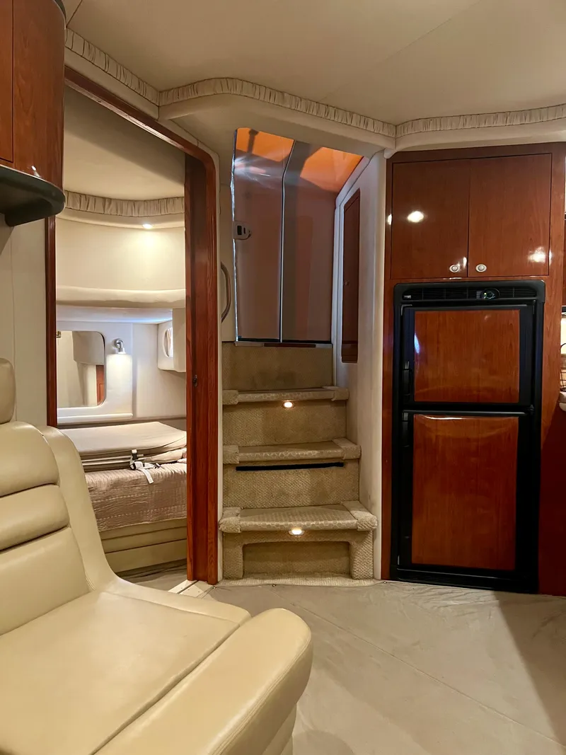 Slide: The Image of Interior of 2004 Sea Ray 46 Sundancer yacht with stairs and cabin. - 11