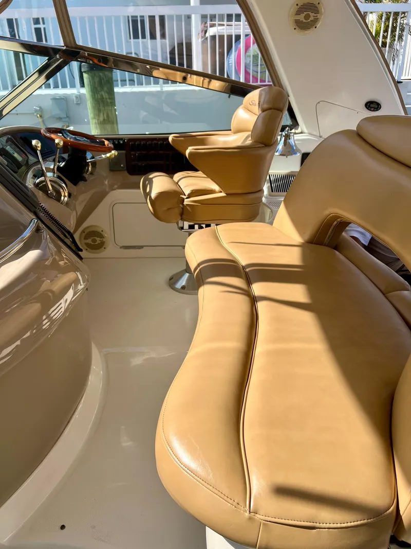 Slide: The Image of Luxurious leather seating in the 2004 Sea Ray 46 SUNDANCER yacht cockpit. - 18