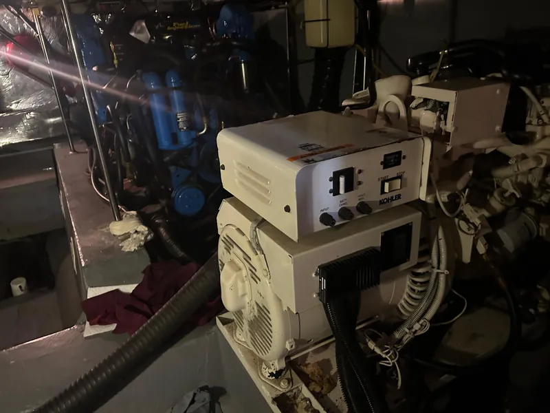 Slide: The Image of Engine room of 1996 Carver 440 Aft Cabin Motor Yacht with Kohler generator. - 12