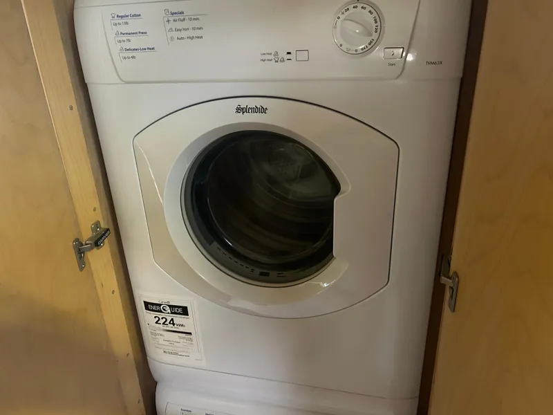 Slide: The Image of Front-loading washer inside Carver 440 Aft Cabin Motor Yacht, 1996 model. - 20