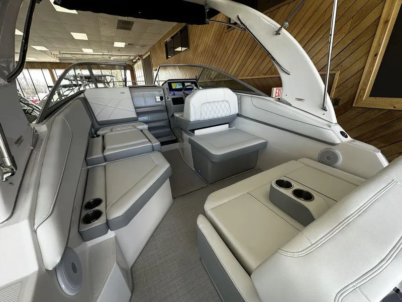 Slide: The Image of Interior of 2024 Regal 26XO boat with luxurious seating and modern design. - 4