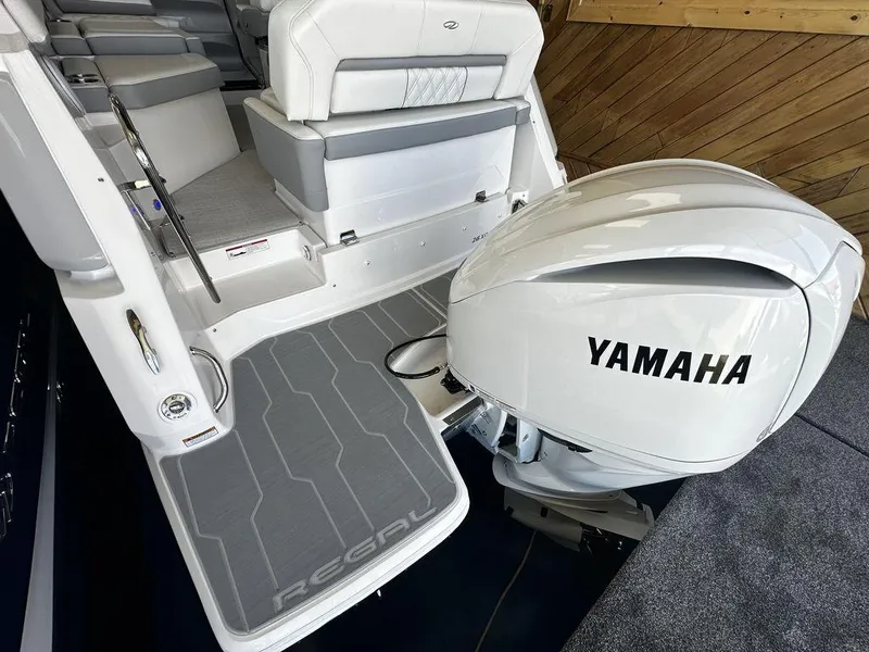 Slide: The Image of 2024 Regal 26XO boat with Yamaha outboard motor. - 5