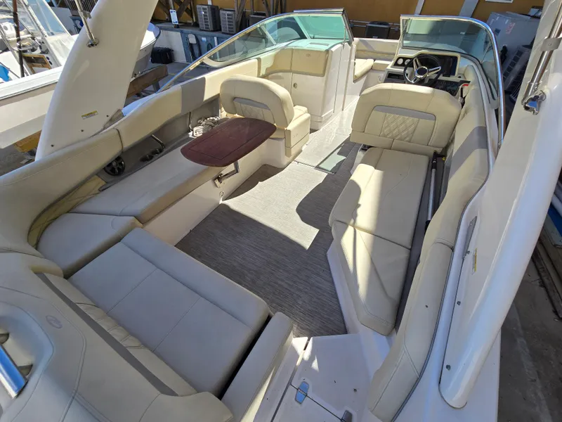 Slide: The Image of 2019 Regal 26 OBX boat interior with spacious seating and modern design. - 32