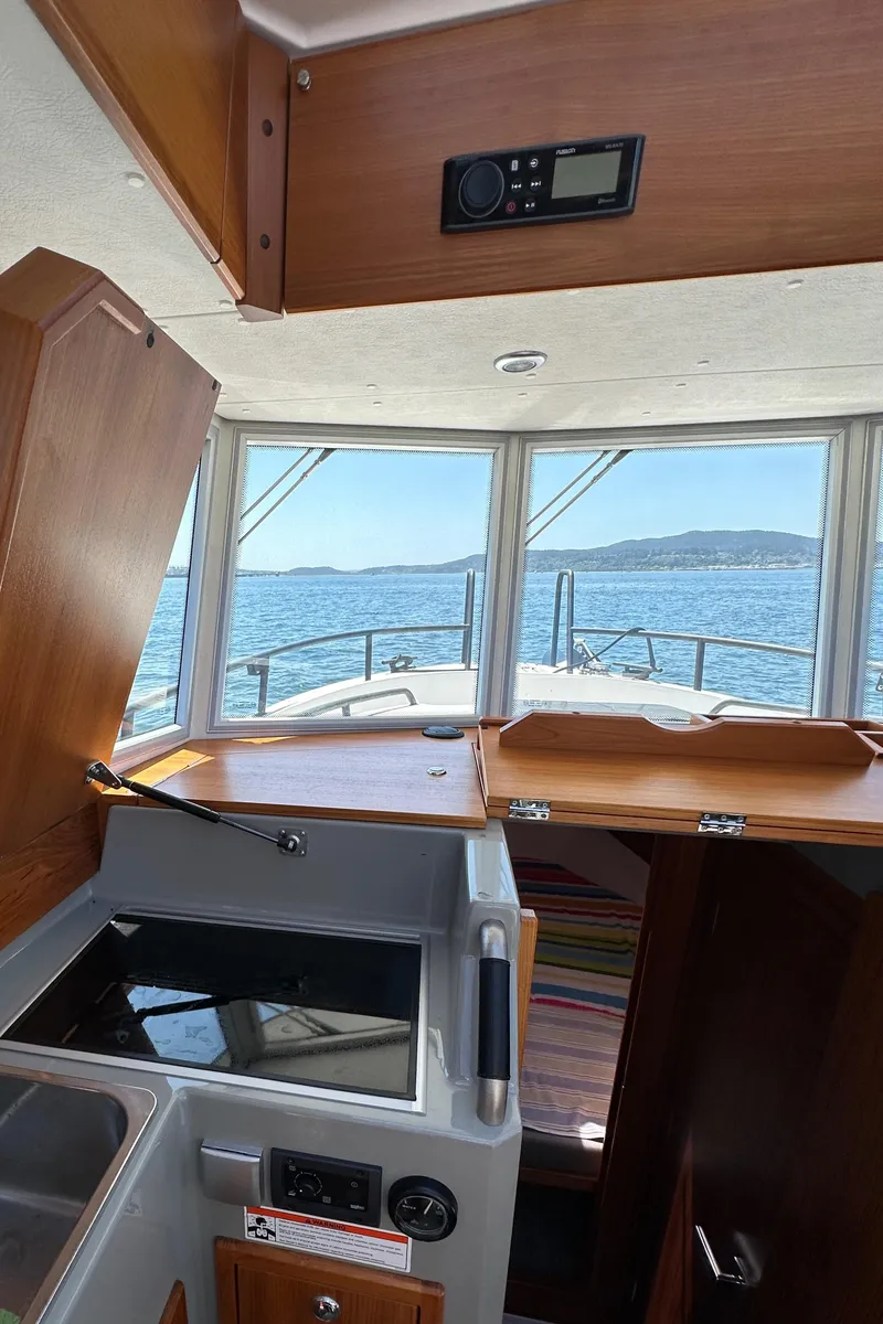 Slide: The Image of Interior view of 2020 Sargo 31 boat with ocean in background. - 18