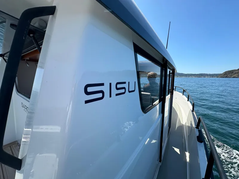 Slide: The Image of 2020 Sargo 31 boat named Sisu cruising on a sunny day. - 20