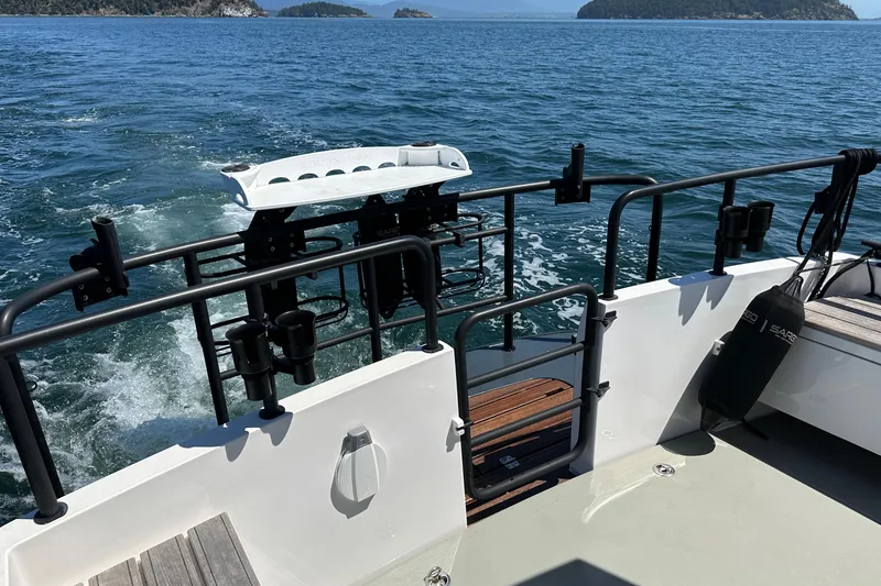 Slide: The Image of Sargo 31 boat (2020) cruising on open water with scenic island views. - 28