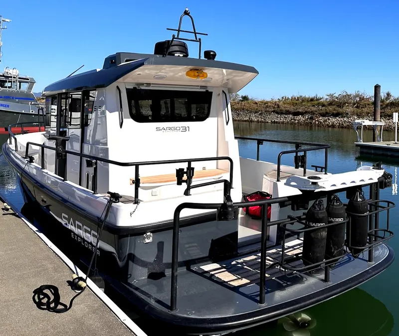 Slide: The Image of Sargo 31 boat docked at marina, 2020 model. - 29
