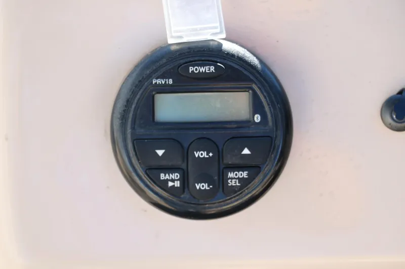 Slide: The Image of Close-up of 2016 Sun Tracker Party Barge 18 DLX audio control panel. - 29