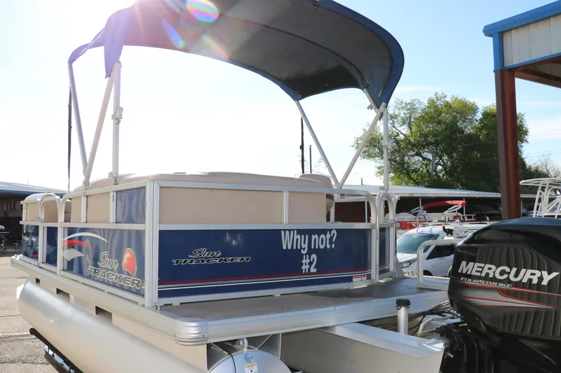 Slide: The Image of 2016 Sun Tracker Party Barge 18 DLX pontoon boat with canopy and Mercury outboard motor. - 6