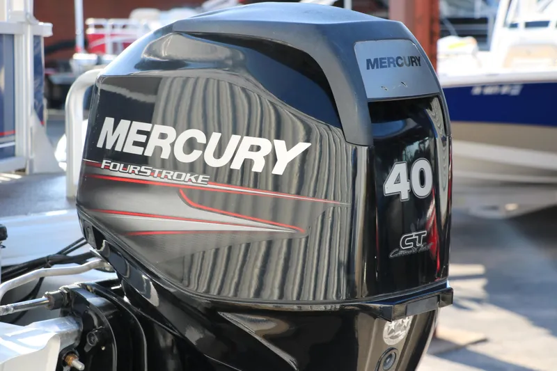 Slide: The Image of Mercury 40 HP FourStroke outboard motor on a 2016 Sun Tracker Party Barge 18 DLX. - 7