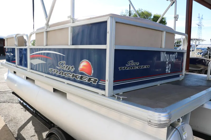 Slide: The Image of 2016 Sun Tracker Party Barge 18 DLX pontoon boat, rear view. - 9