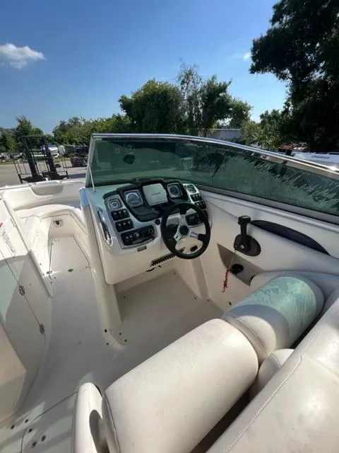 Slide: The Image of 2009 Chaparral 276 SSX boat interior with steering wheel and dashboard. - 10