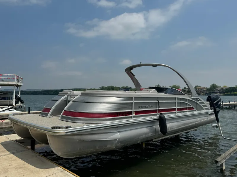 Slide: The Image of 2020 Bennington QSBWAX2SG pontoon boat docked on a sunny day. - 4
