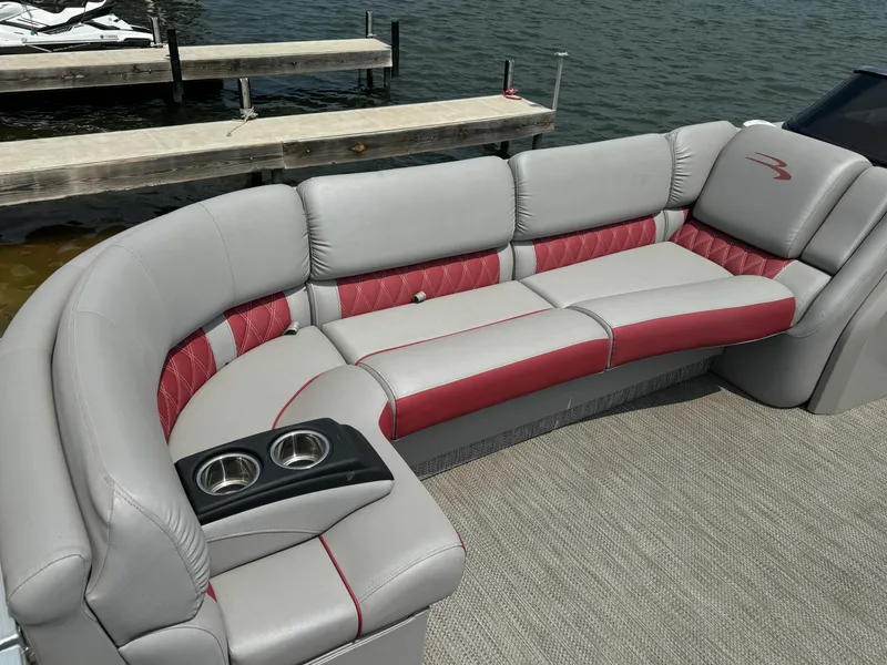 Slide: The Image of 2020 Bennington QSBWAX2SG boat with luxurious seating and cup holders. - 5