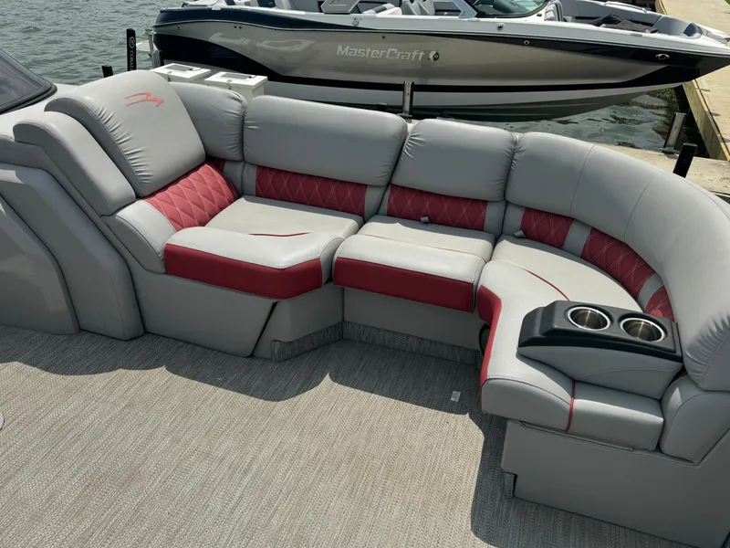 Slide: The Image of 2020 Bennington QSBWAX2SG boat with luxurious seating and cup holders. - 6