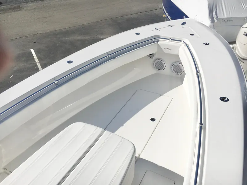 Slide: The Image of 2024 Contender 32 ST boat deck with seating and speakers. - 14