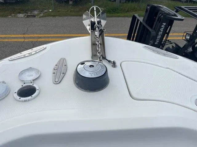 Slide: The Image of 2008 Hydra-Sports 3300 CC boat deck with anchor and chain mechanism. - 10