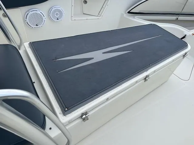 Slide: The Image of 2008 Hydra-Sports 3300 CC boat interior with storage compartment and speakers. - 9