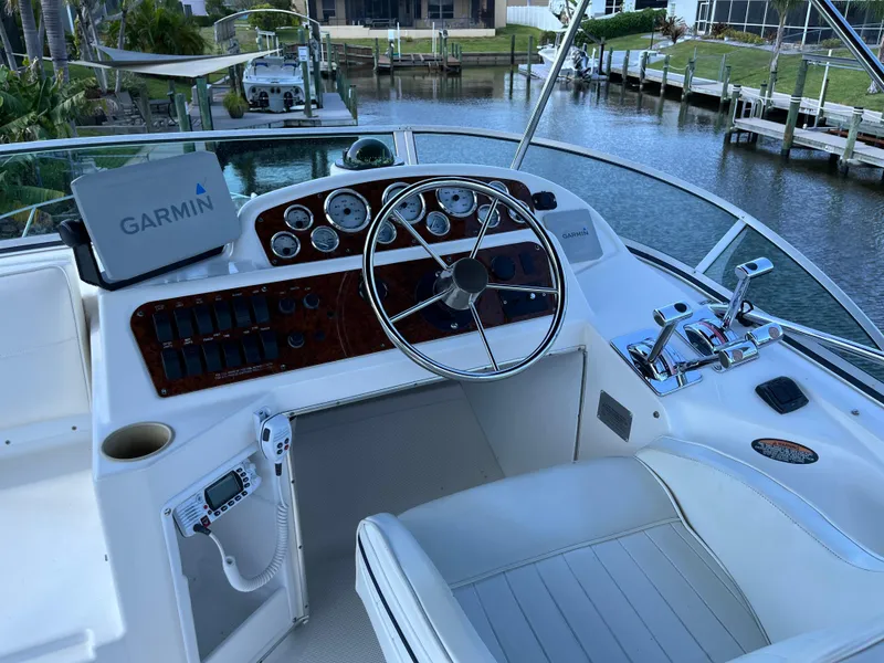 Slide: The Image of Bayliner 3258 Ciera Command Bridge DX 2000 helm with Garmin navigation system. - 36