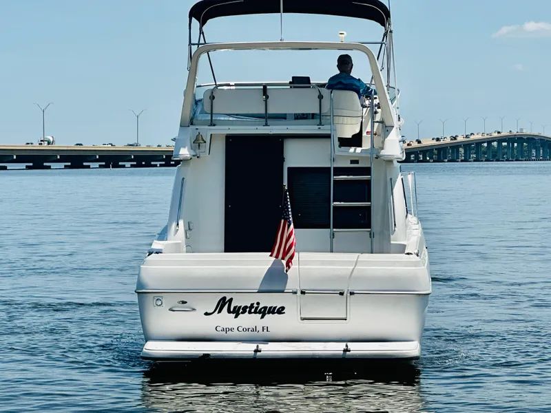 Slide: The Image of Bayliner 3258 Ciera Command Bridge DX 2000 boat named Mystique in Cape Coral, FL. - 4