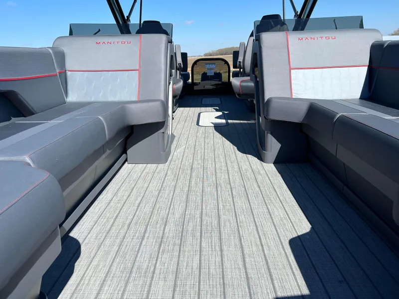 Slide: The Image of 2024 Manitou EXPLORE 24 MAX NAVIGATOR VTOON interior with sleek seating and modern design. - 12