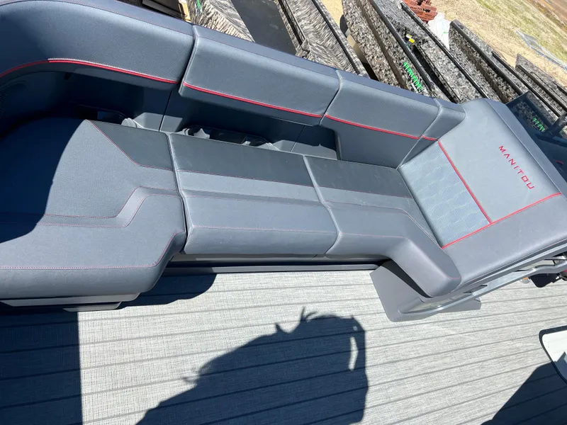 Slide: The Image of Luxurious seating on 2024 Manitou EXPLORE 24 MAX NAVIGATOR VTOON boat, featuring sleek design. - 9