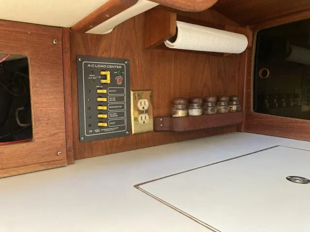 Slide: The Image of Control panel and outlets in the cabin of a 1980 Sceptre 36 boat. - 14