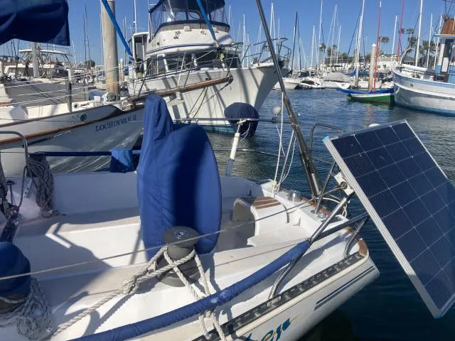 Slide: The Image of Sceptre 36 sailboat from 1980 docked at a marina with solar panel. - 19