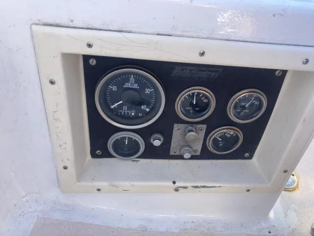 Slide: The Image of Control panel of a 1980 Sceptre 36 boat with various gauges and dials. - 22