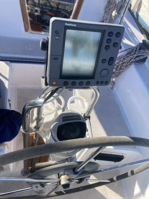 Slide: The Image of 1980 Sceptre 36 sailboat helm with Raytheon navigation system. - 23