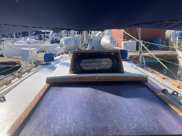 Slide: The Image of 1980 Sceptre 36 sailboat deck view at marina with other boats. - 24