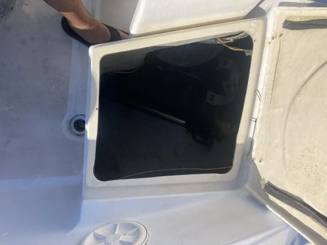 Slide: The Image of Open hatch on a 1980 Sceptre 36 boat showing storage compartment. - 26